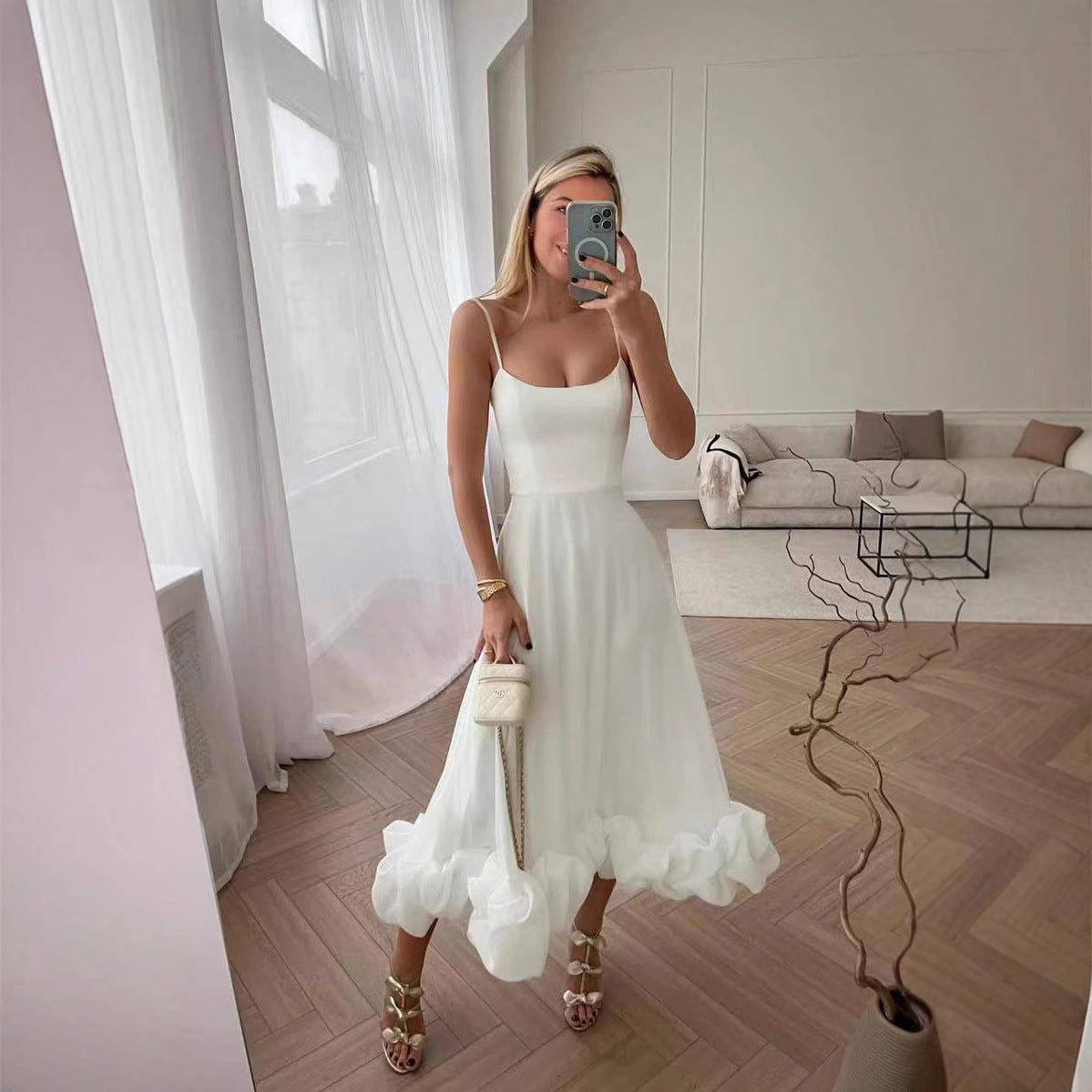Women's A-line dress with A large halter strap and three-dimensional flowers
