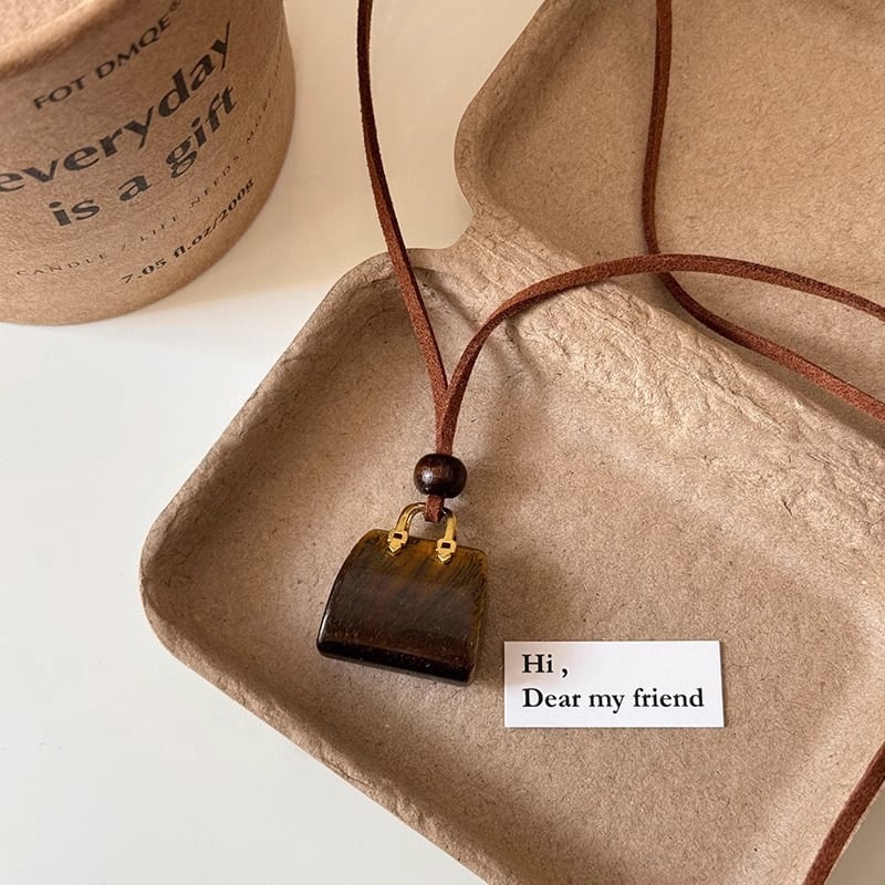 Korean velvet rope tiger eye stone bag necklace women's niche design high-end sweater chain autumn and winter long pendant accessories
