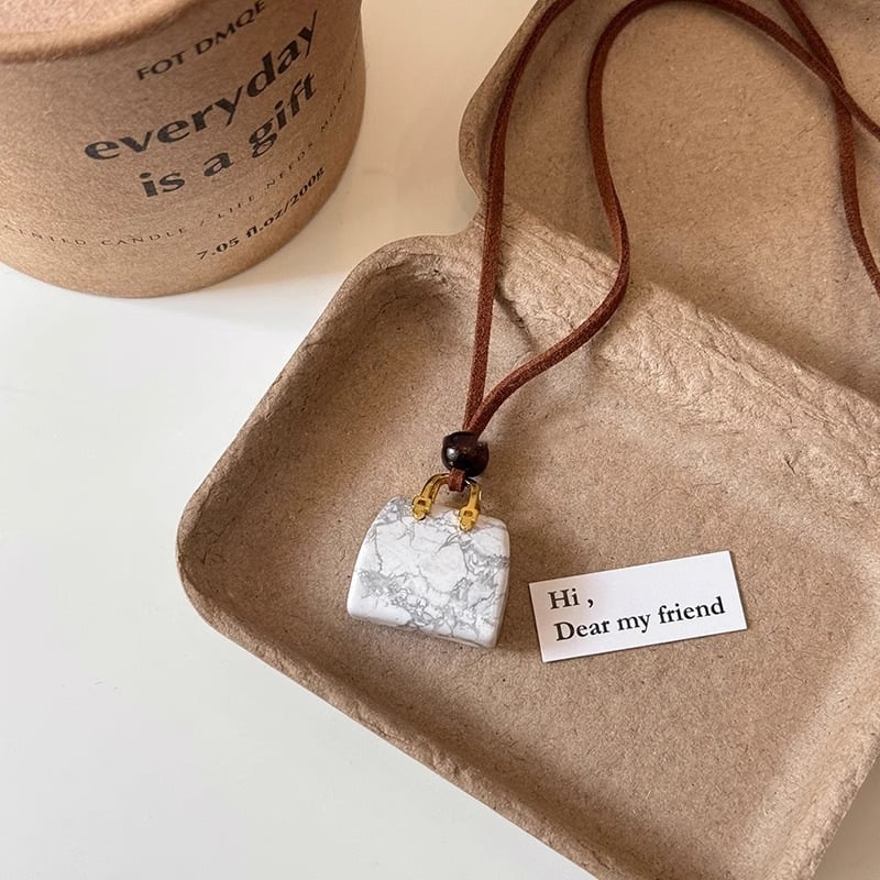 Korean velvet rope tiger eye stone bag necklace women's niche design high-end sweater chain autumn and winter long pendant accessories