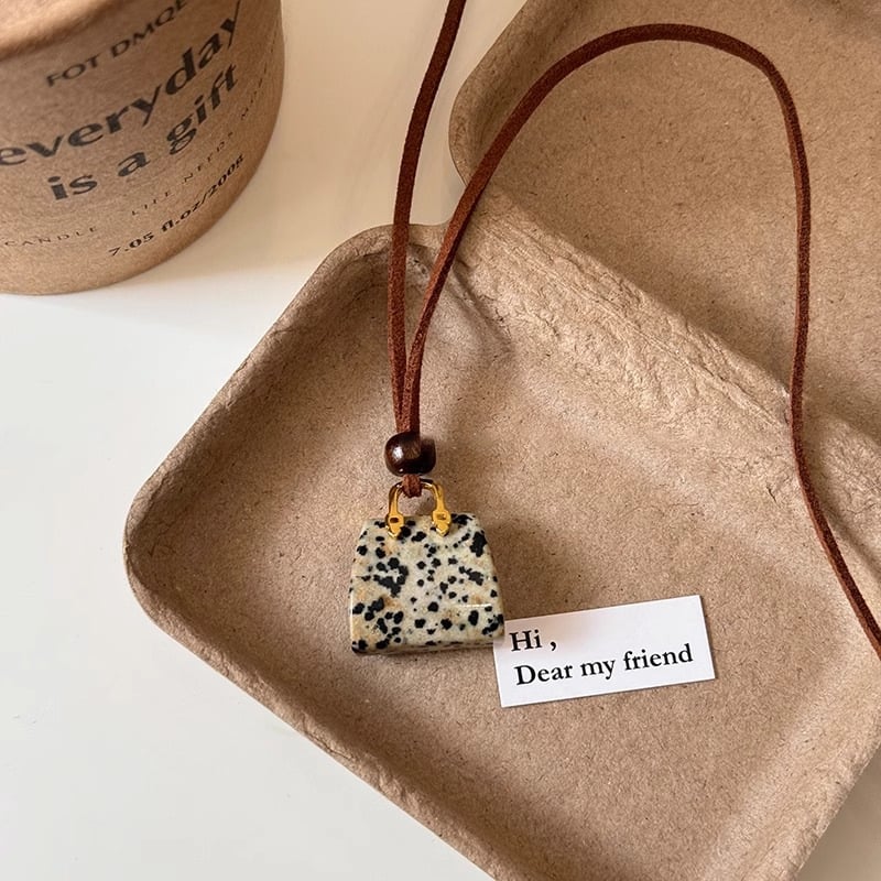 Korean velvet rope tiger eye stone bag necklace women's niche design high-end sweater chain autumn and winter long pendant accessories